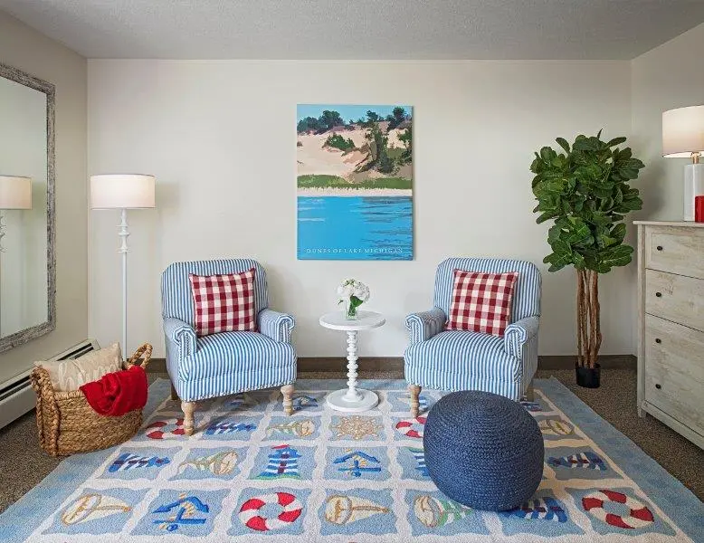 Apartment living room at American House Kentwood Elder Home